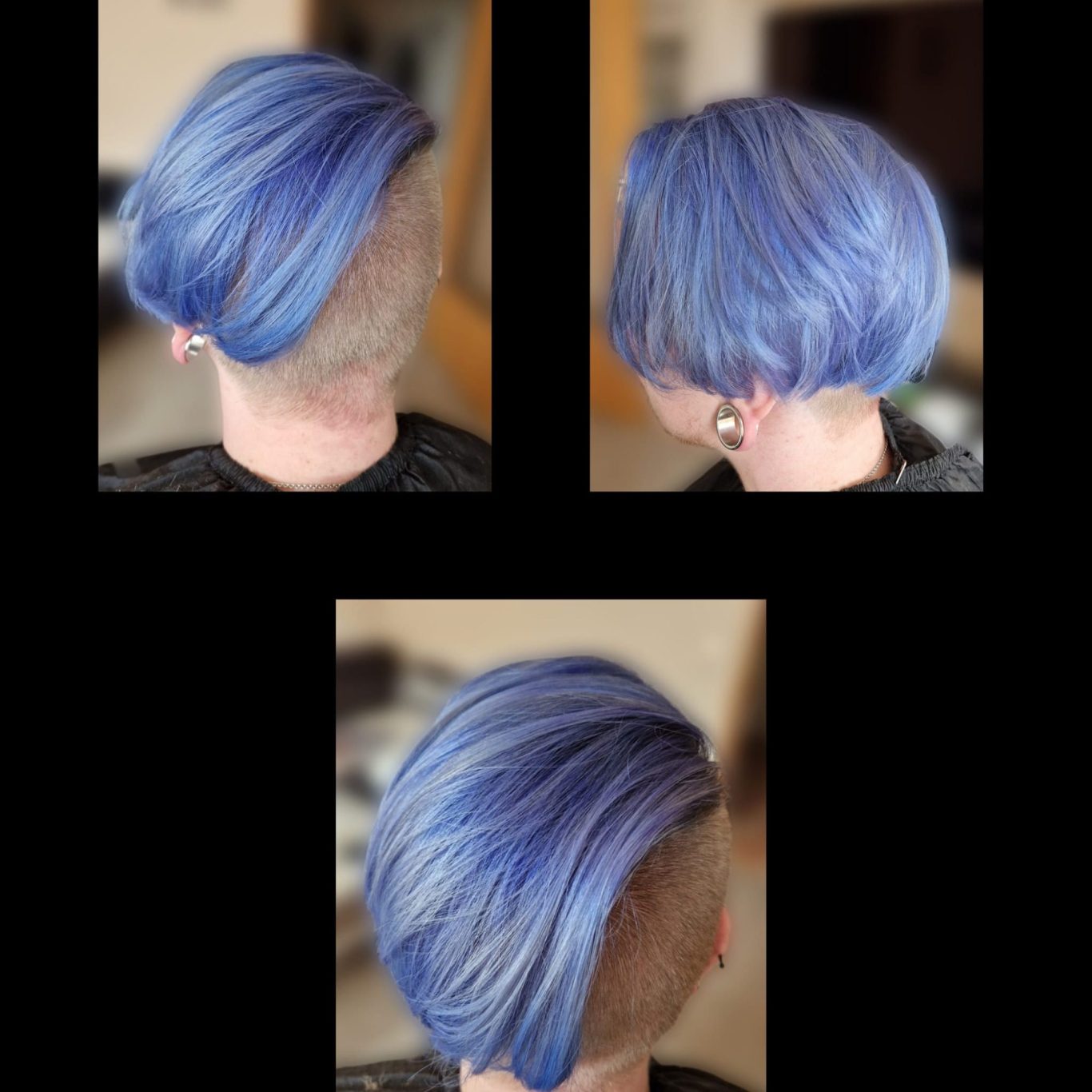 Haarschnitt mit blauen, glänzenden Strähnen und rasiertem Nacken.